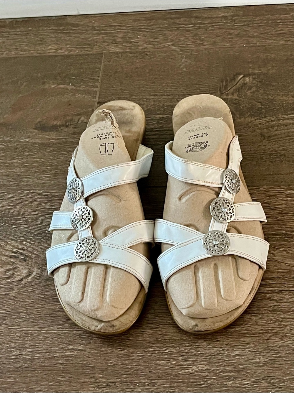 Jasmine White Triple-Strap Slide Sandals with Silver Medallions